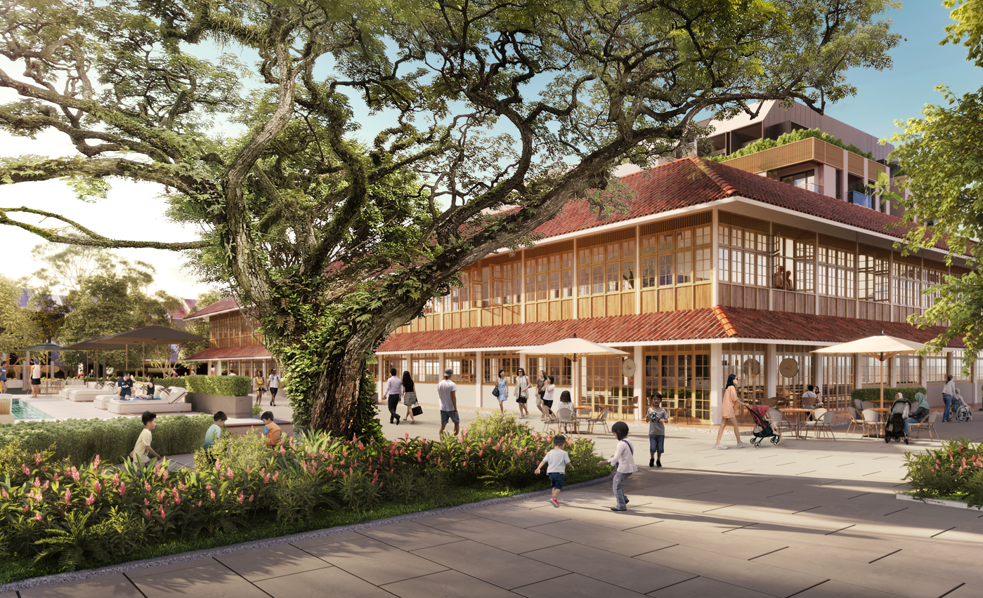 Outdoor scene with a large tree and a two-story building. People are walking and sitting outside.